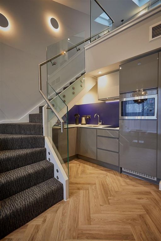 Property photo 3 of 7 Contemporary Kitchenette Beneath A Stylish Carpete...