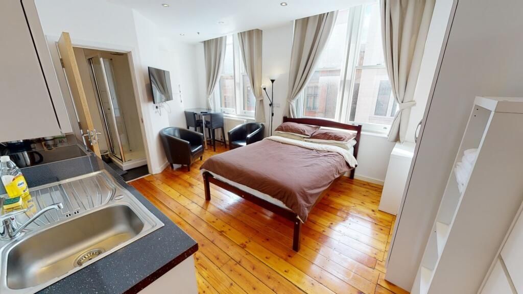 Property photo 2 of 9 Bright And Spacious Master Bedroom Featuring A Lar...