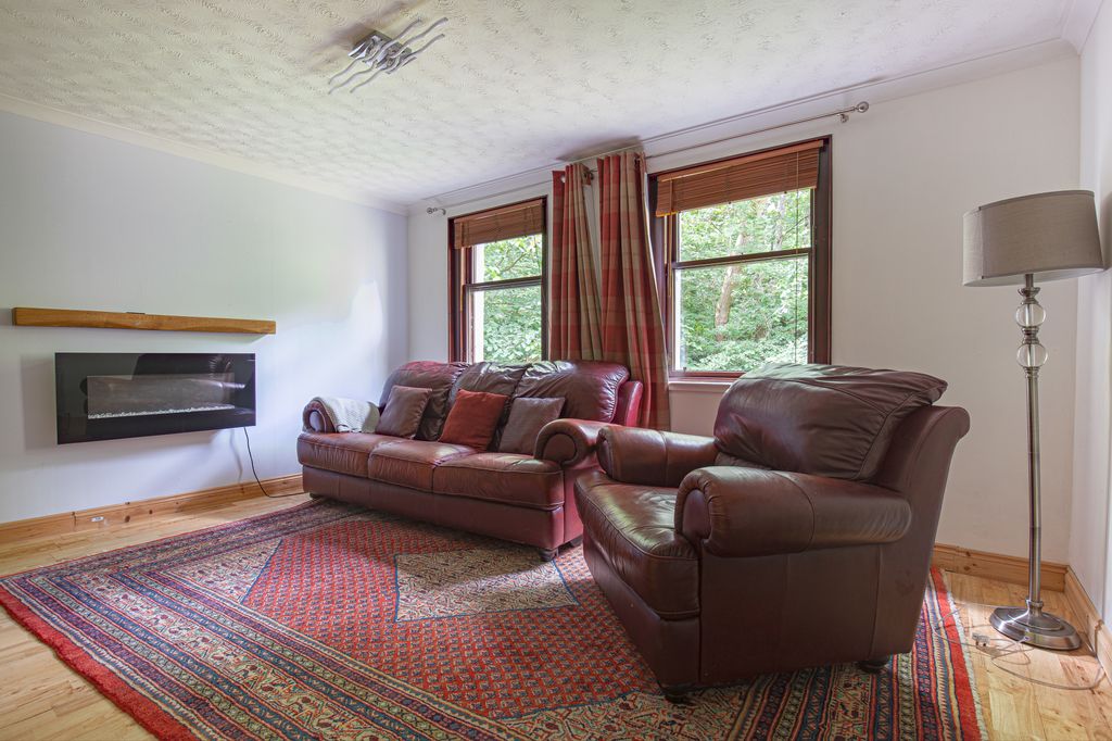 Property photo 3 of 11 Living Room Angle 1