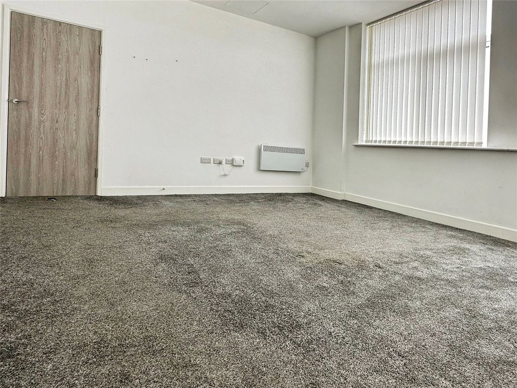 Property photo 2 of 6 Living Area