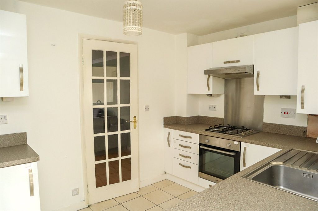 Property photo 2 of 12 Kitchen