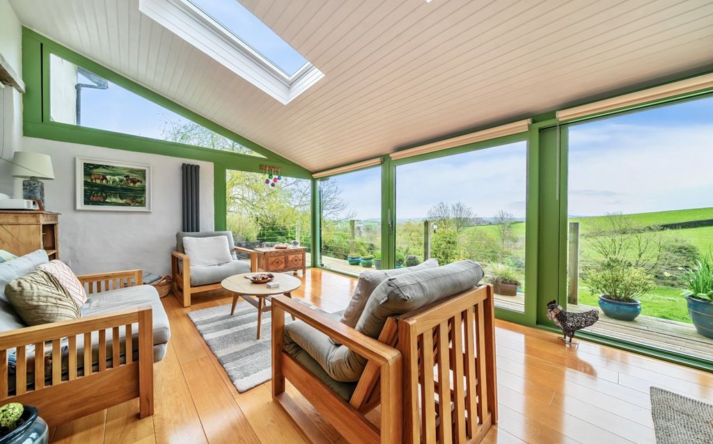 Property photo 2 of 24 Sunroom