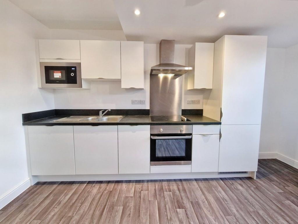 Property photo 3 of 9 Kitchen Area