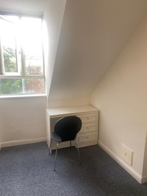 Property photo 3 of 4 Bright Small Bedroom Nook With A Sloped Ceiling, A...