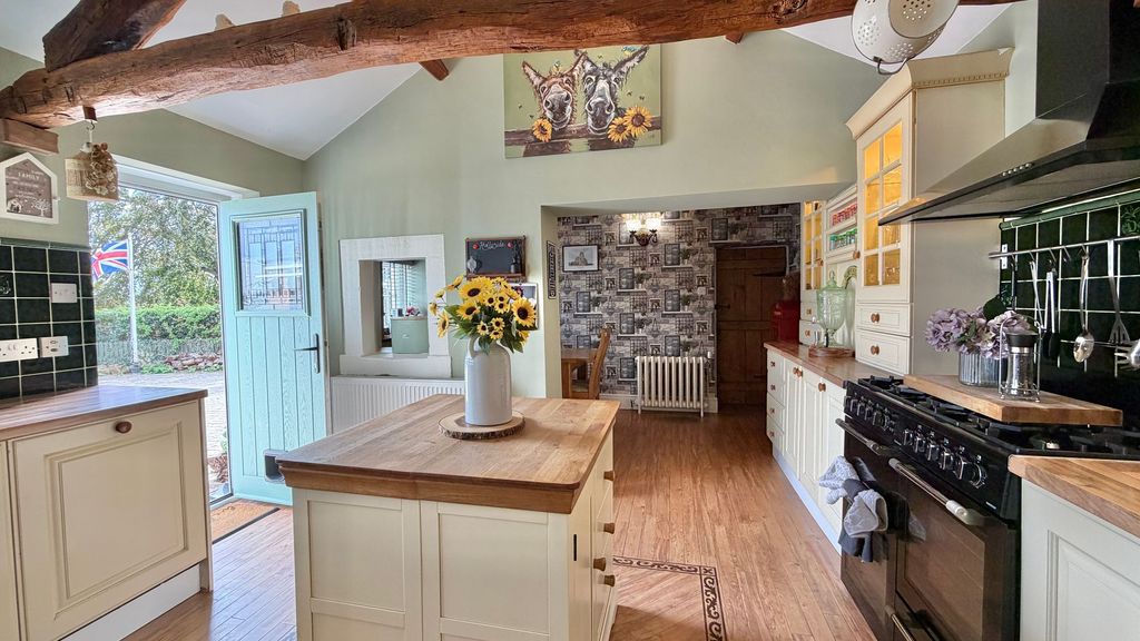 Property photo 3 of 29 Dining Kitchen