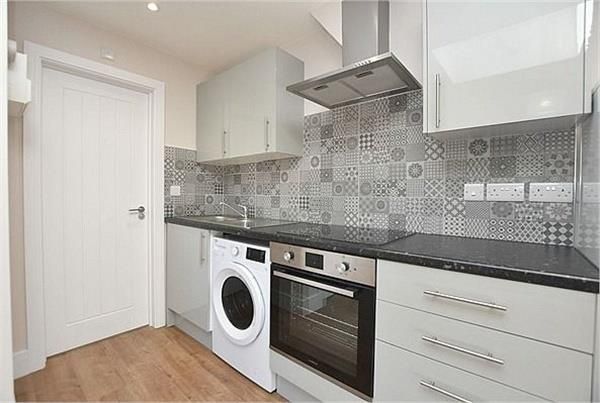 Property photo 2 of 6 Kitchen & Living Area