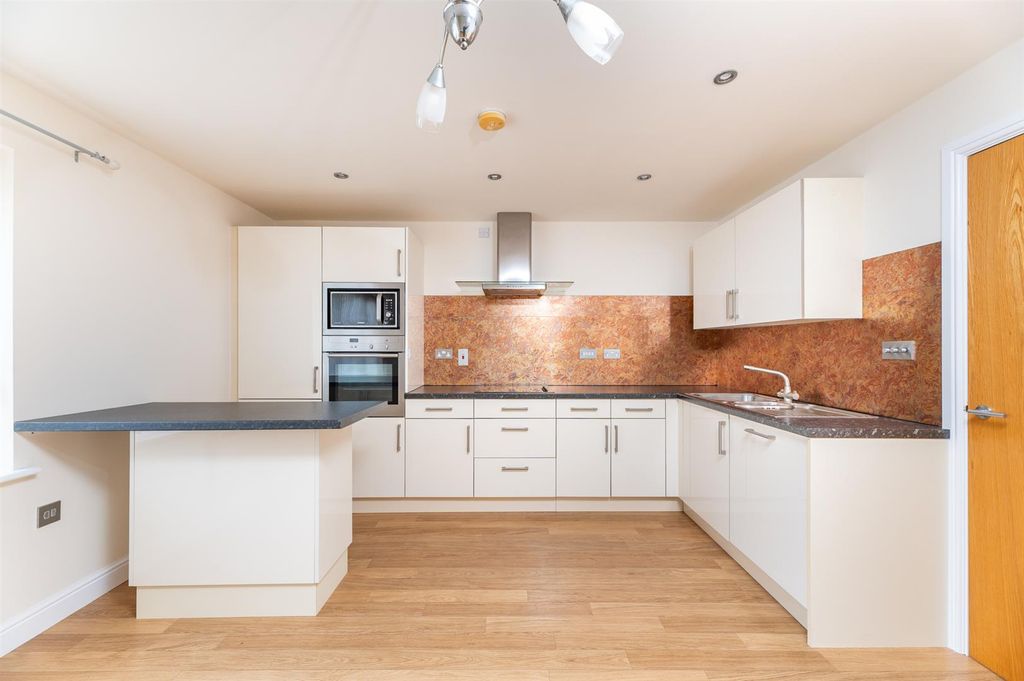 Property photo 2 of 19 Kitchen Area