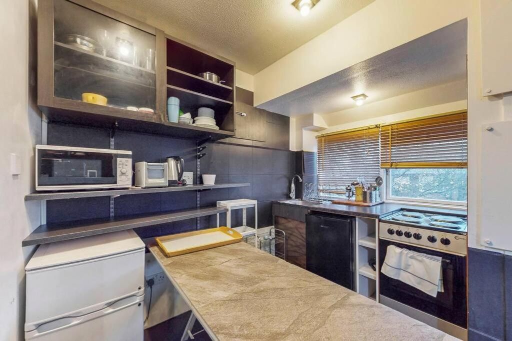 Property photo 3 of 9 A Functional Kitchen With Ample Storage And Natura...