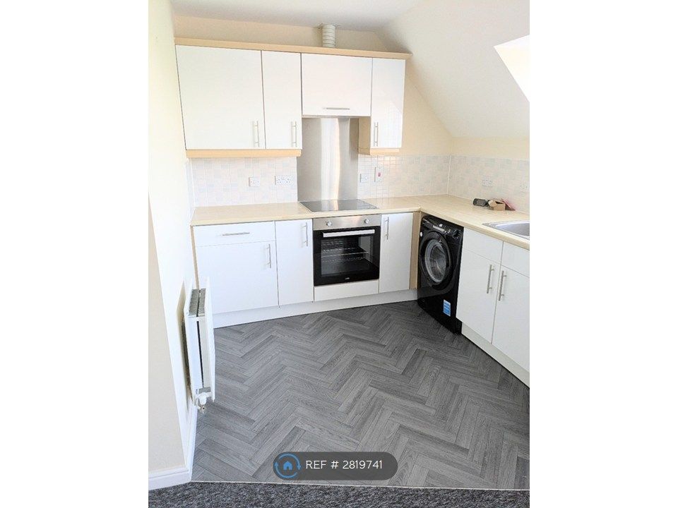 Property photo 2 of 12 Kitchen With New Flooring And Cupboard Doors