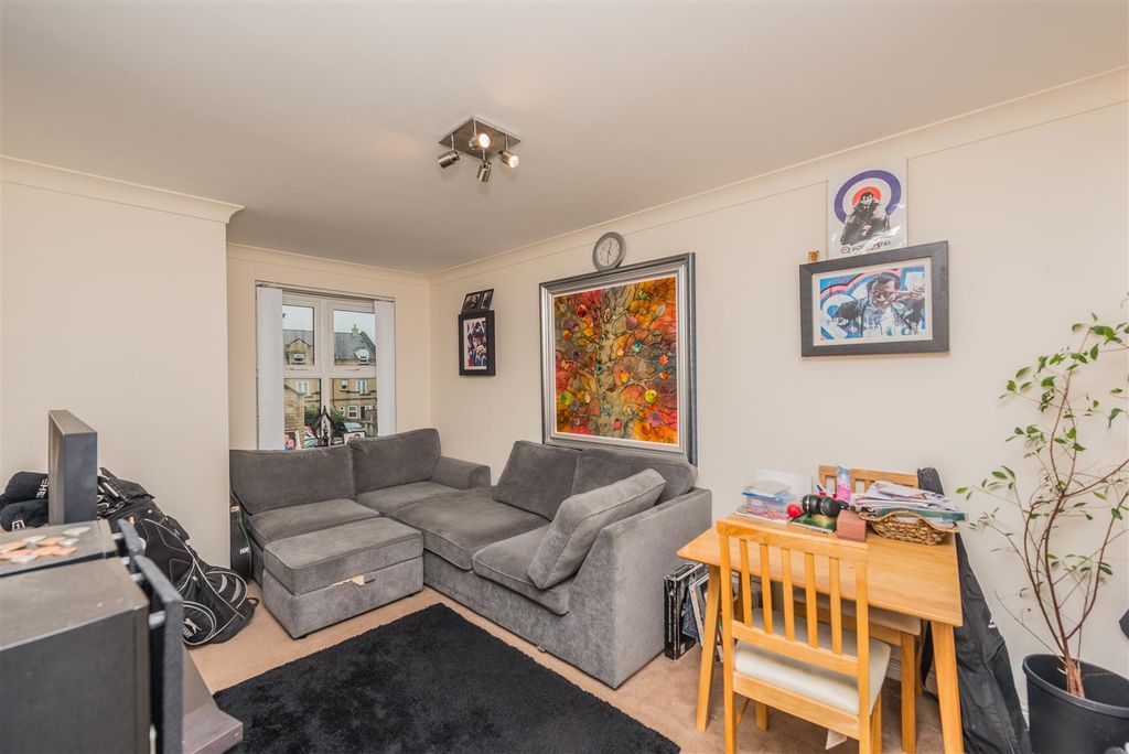 Property photo 2 of 16 Living / Dining Area: