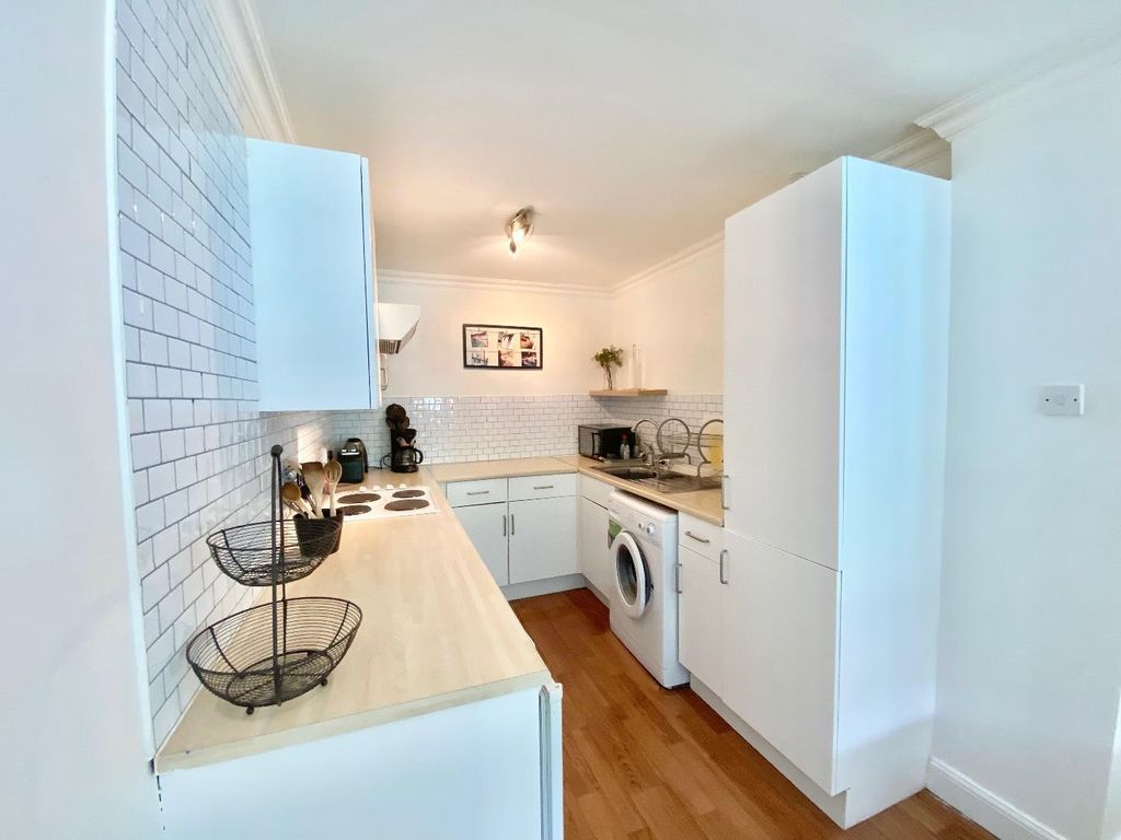 Property photo 2 of 13 Kitchen Area