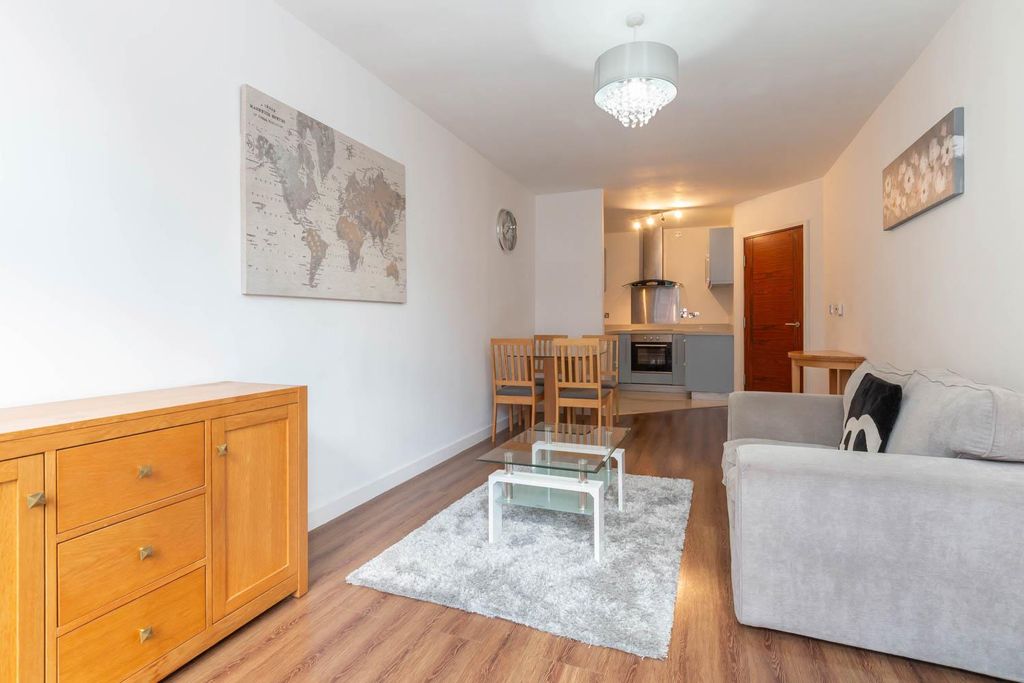 Property photo 3 of 8 Living Area