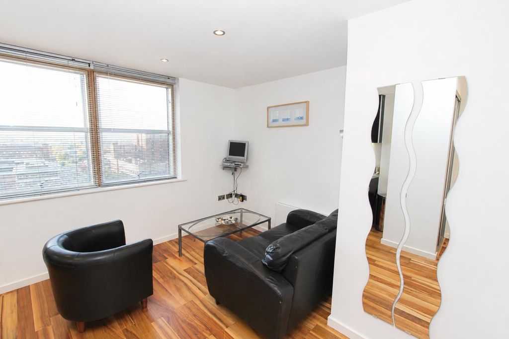 Property photo 3 of 6 Bright Lounge With City Views And Leather Sofa...