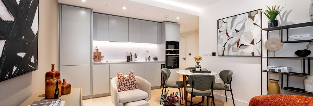 Property photo 1 of 4 Living Space In Foreground, Kitchenette, Dining Table And Shelving In Background