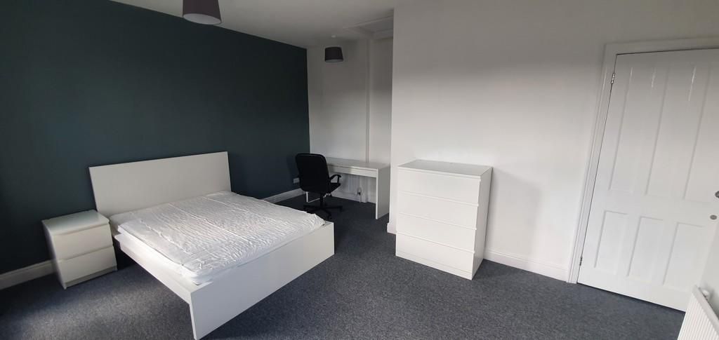 Property photo 1 of 8 Spacious And Tidy Master Bedroom Featuring A Comfo...