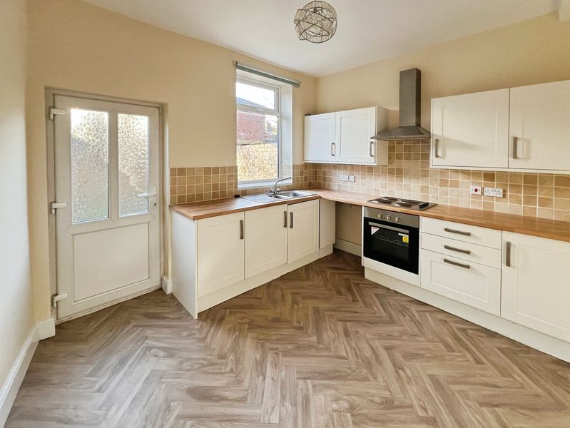 Property photo 3 of 12 Kitchen