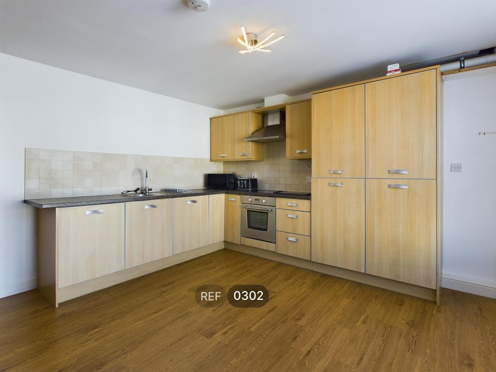 Property photo 2 of 16 Kitchen &amp; Living Area