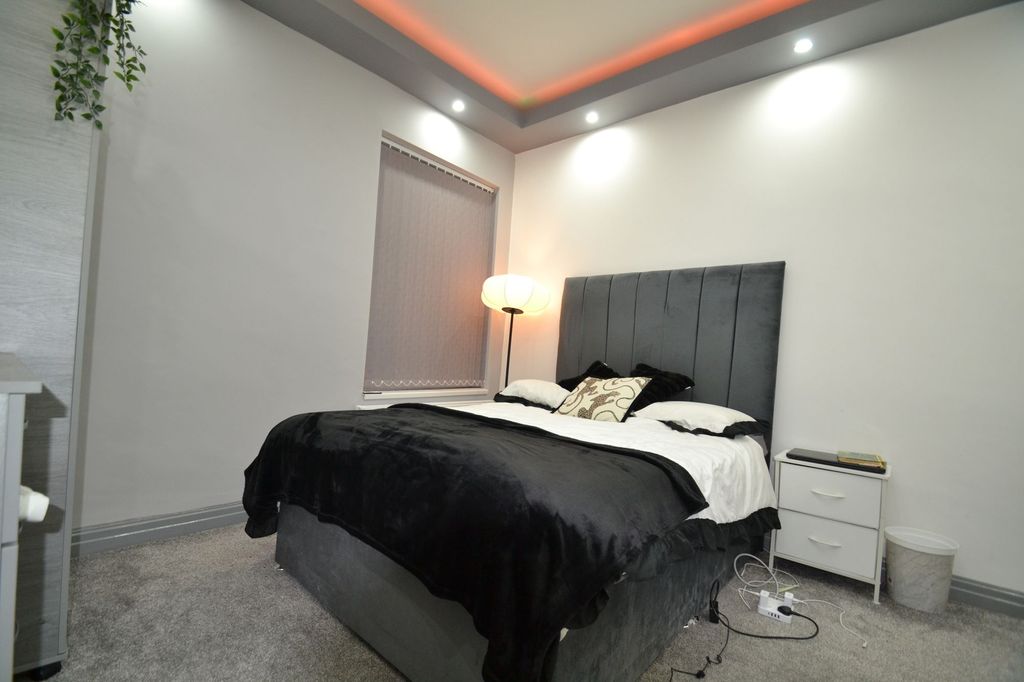 Property photo 2 of 49 Stylish Double Bedroom With A Tall Upholstered Hea...