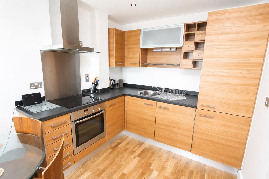 Property photo 3 of 6 Modern Kitchen With Stylish Wooden Cabinets...