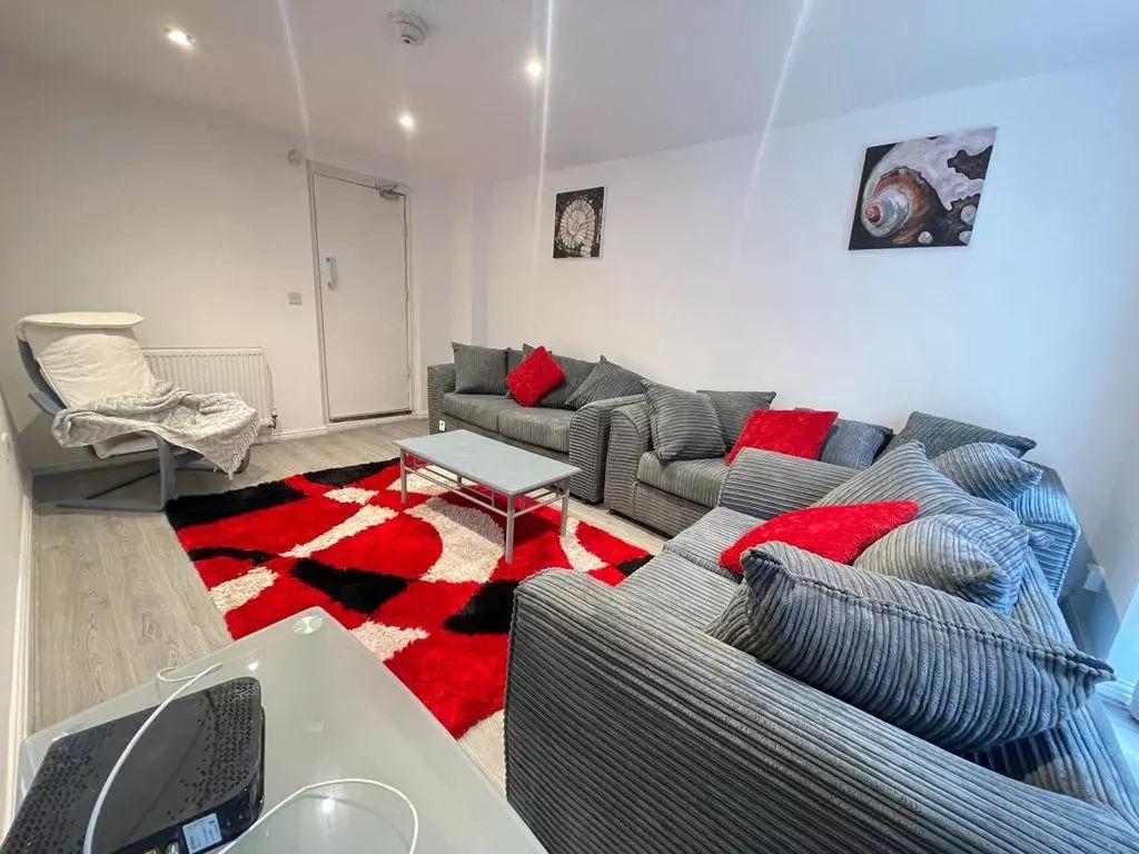 Property photo 1 of 4 A Contemporary Living Room Featuring Comfortable G...