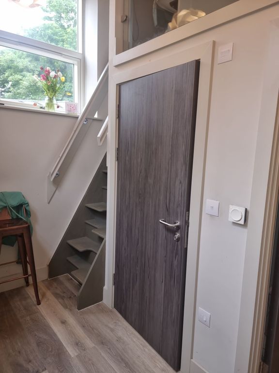 Property photo 3 of 6 Bright, Modern Hallway With Wood-Effect Flooring, ...