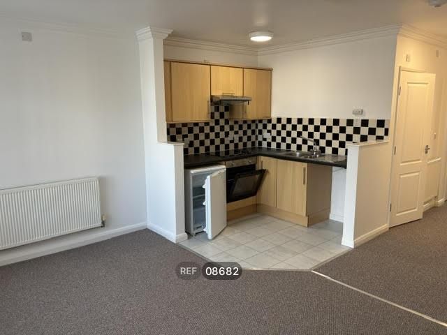 Property photo 2 of 8 Kitchen/Living Area