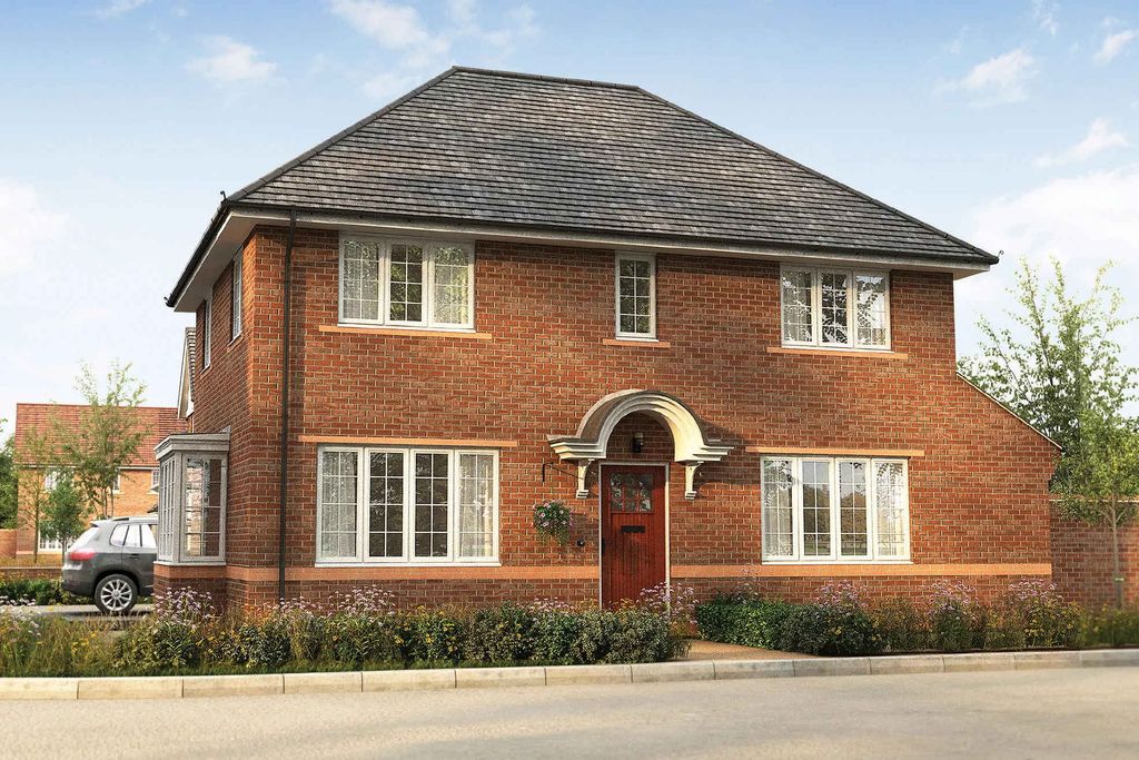 Property photo 1 of 10 A Two-Story Brick House With A Gabled Roof And A Prominent Entryway