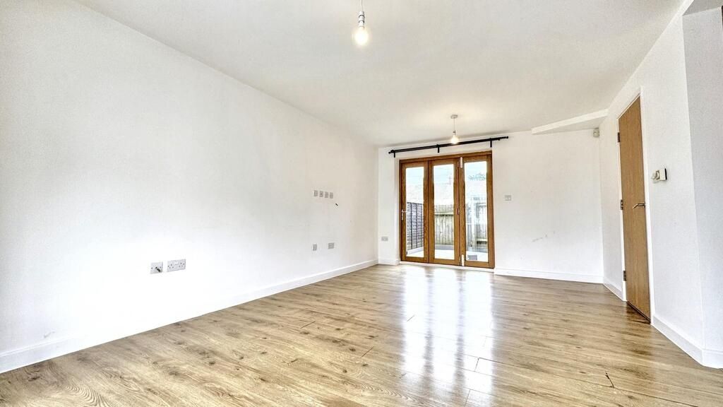 Property photo 1 of 15 Bright Open Living Room With Wooden Floors...