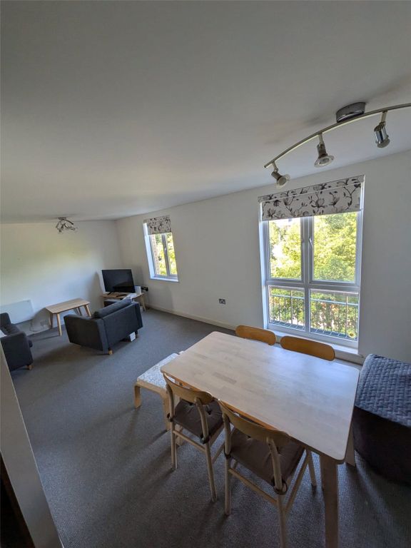 Property photo 3 of 12 Living/Dining Area