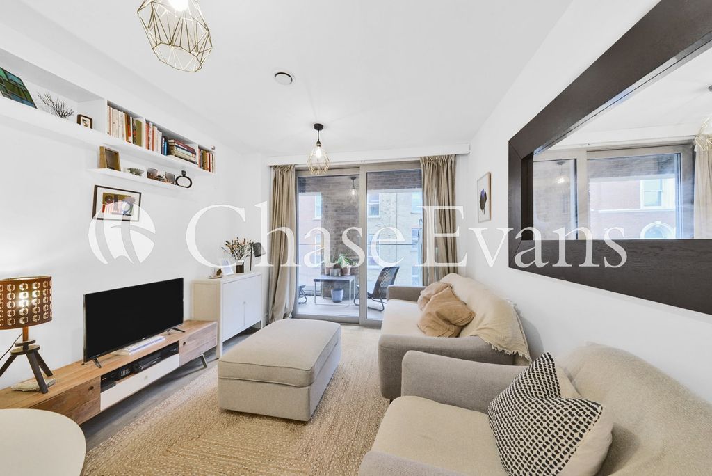 Property photo 3 of 12 Living Area