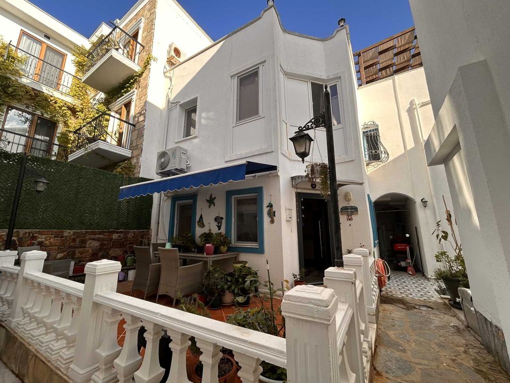 Property photo 1 of 22 A Pretty Semi-Detached Triplex Villa In Bodrum For Sale - Main View Of The Villa