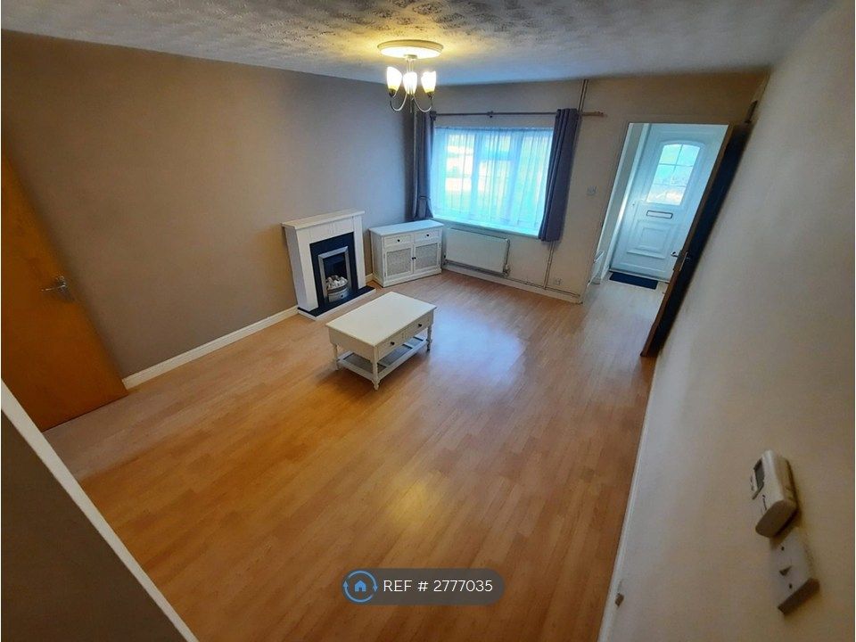 Property photo 2 of 8 Spacious Living Room