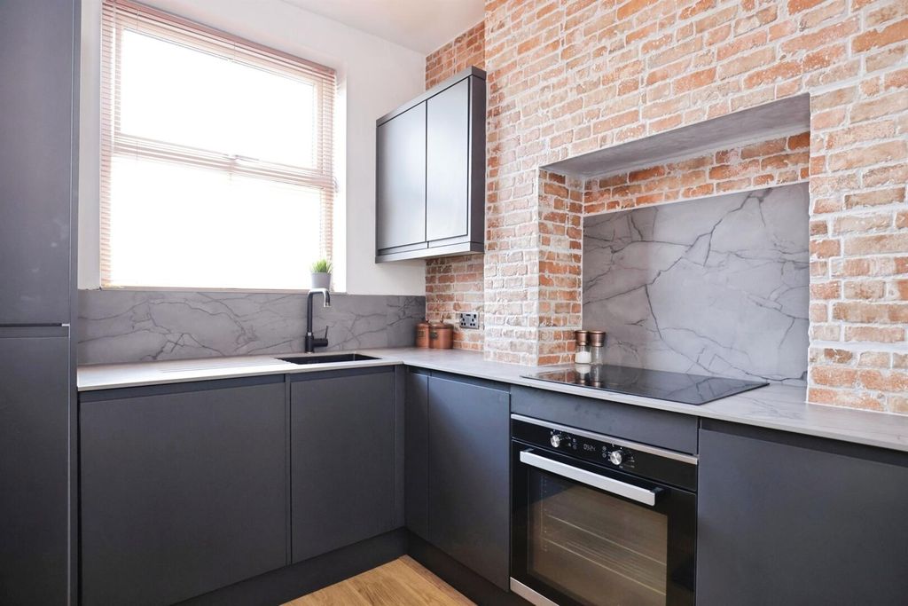 Property photo 3 of 16 Kitchen