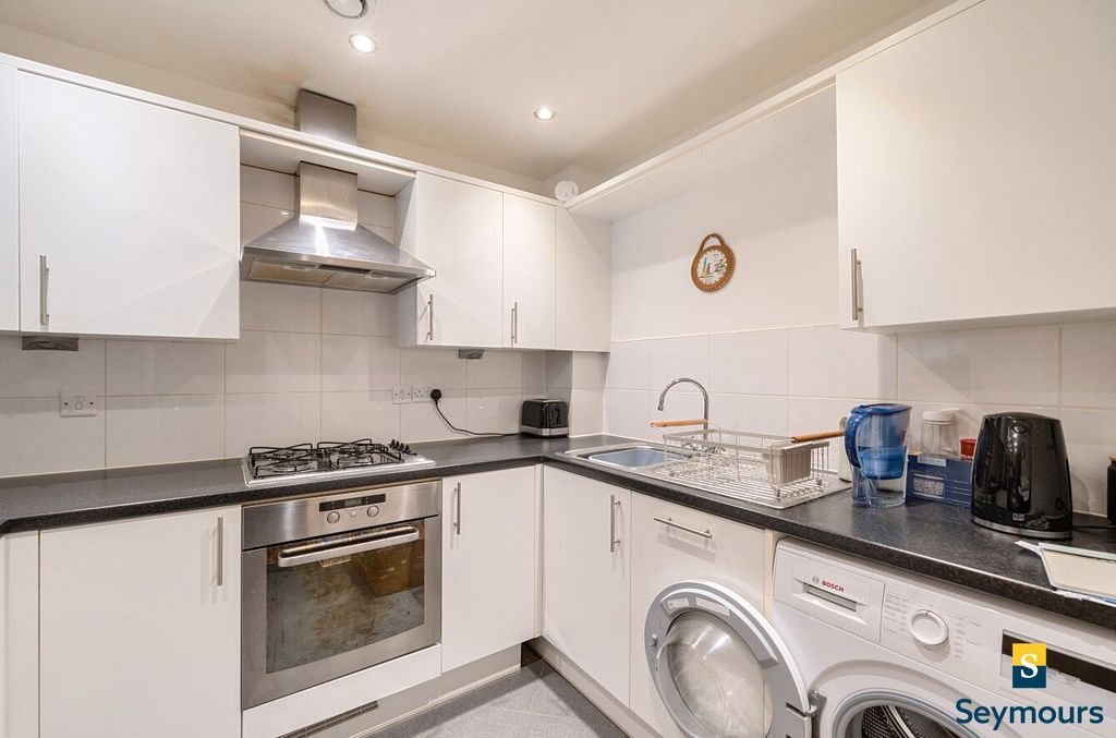 Property photo 3 of 16 Kitchen