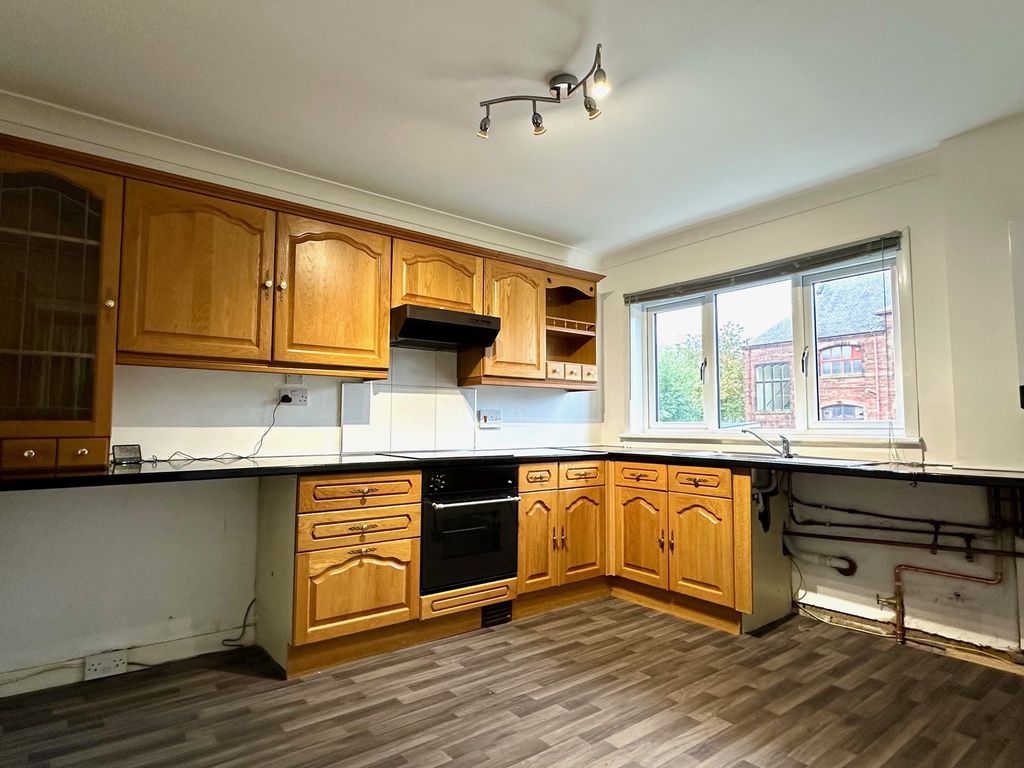 Property photo 3 of 7 Kitchen