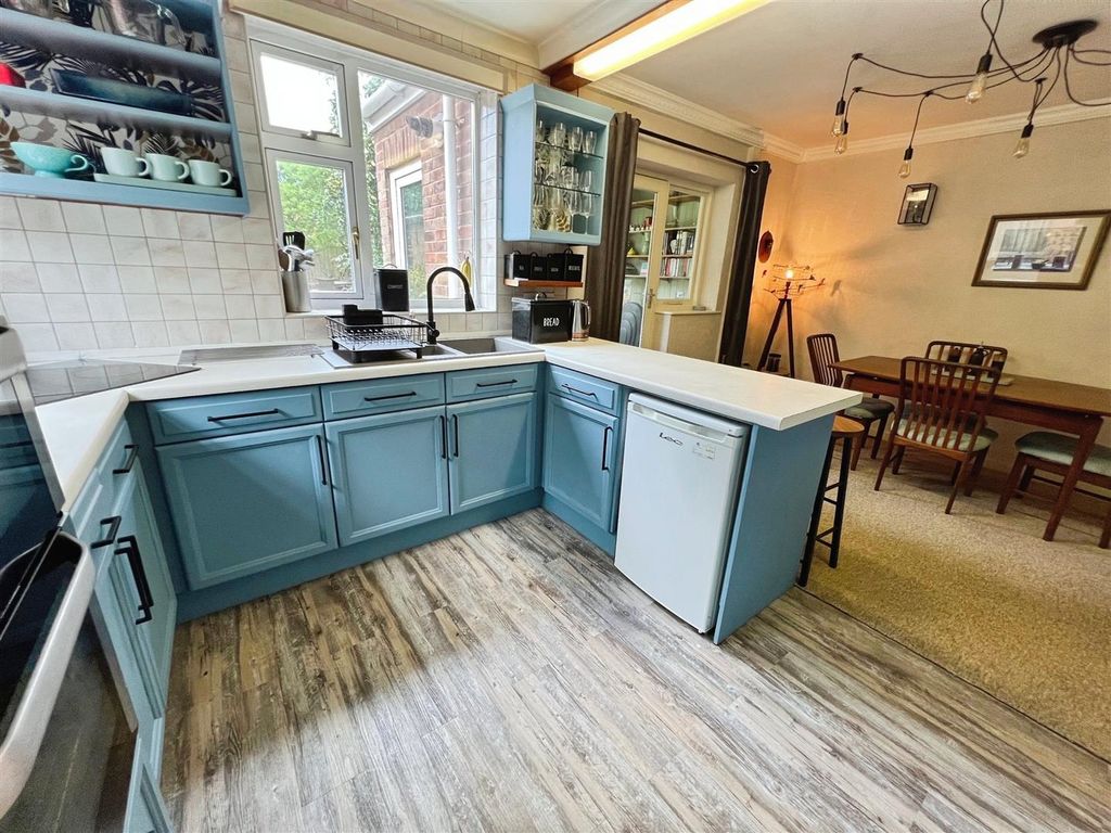 Property photo 3 of 18 Dining Kitchen
