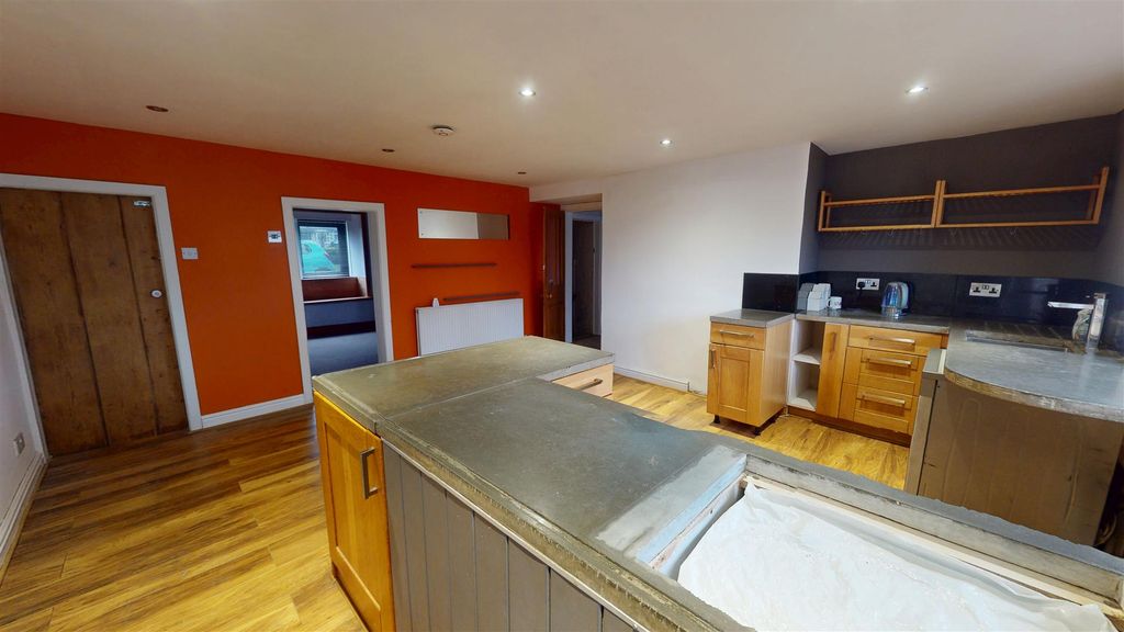 Property photo 2 of 12 Dining Kitchen