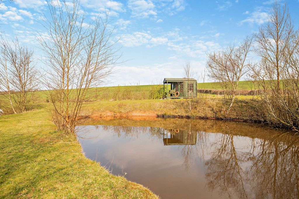 Property photo 3 of 32 Pond
