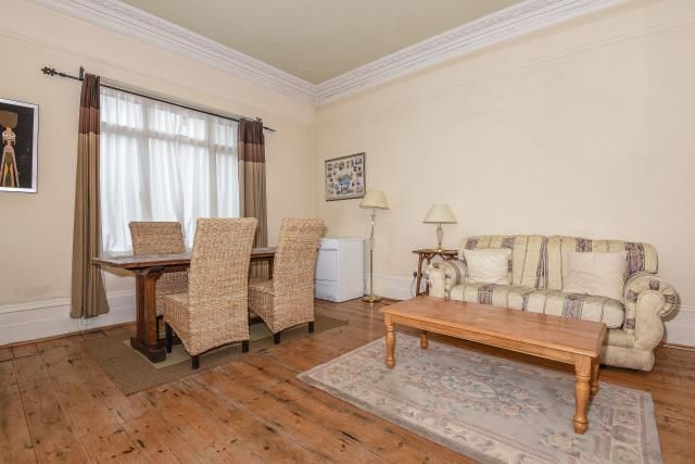 Property photo 3 of 7 Living/Dining Room