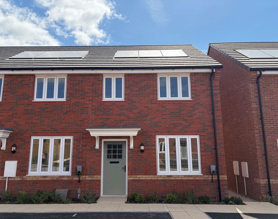 Property photo 1 of 9 A Modern Red Brick House With White-Framed Windows And A Light Green Door Stands In The Foreground