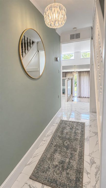 Property photo 2 of 16 Hallway Middle Wall.Png