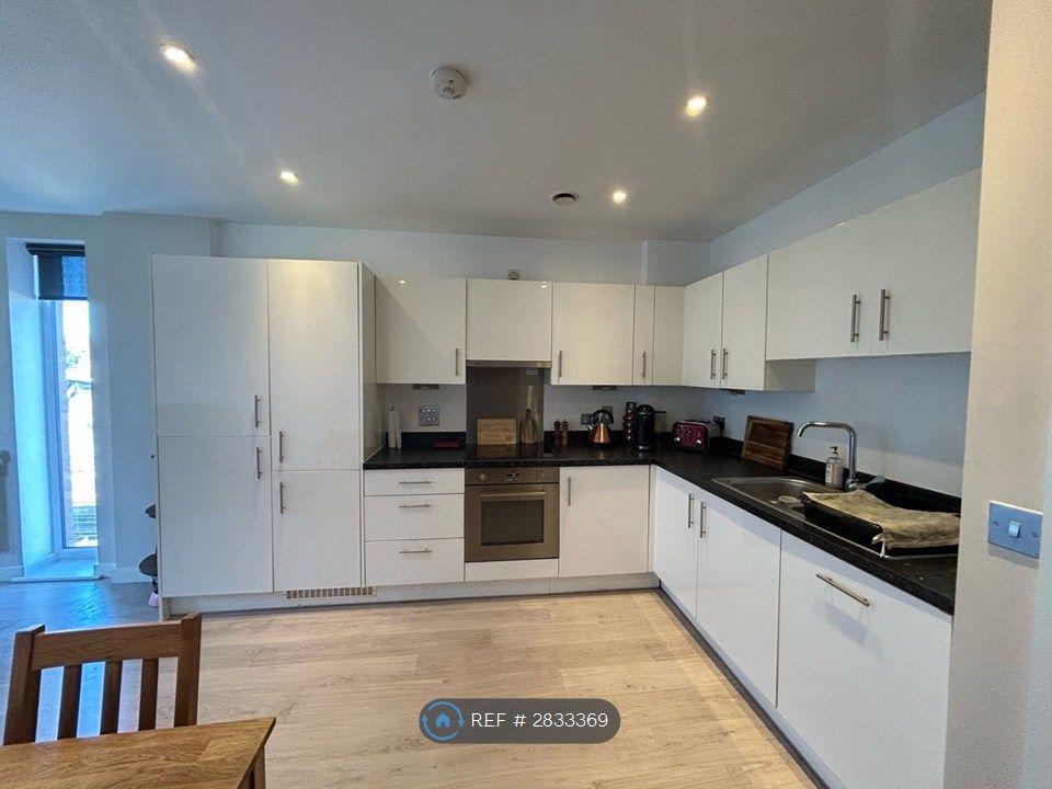 Property photo 3 of 8 Kitchen