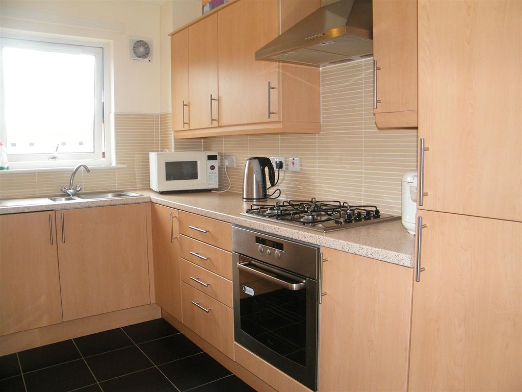 Property photo 3 of 6 Kitchen