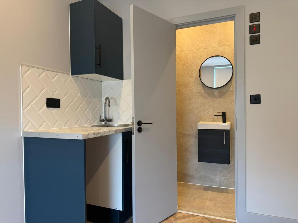 Property photo 1 of 7 Utility Room