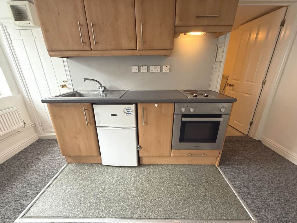 Property photo 2 of 7 Kitchen Area