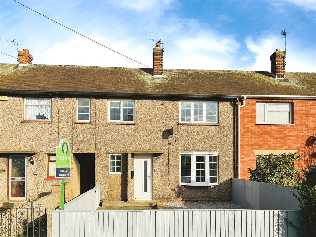 Property photo 3 of 18 Front