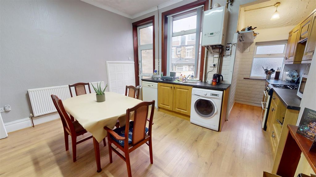 Property photo 3 of 12 Dining Kitchen