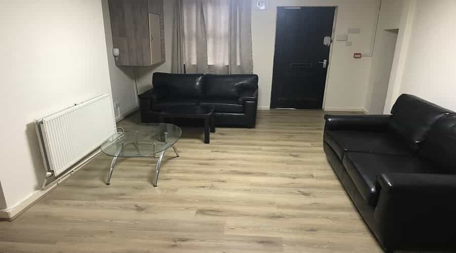 Property photo 3 of 7 A Spacious, Well-Maintained Living Room Featuring ...