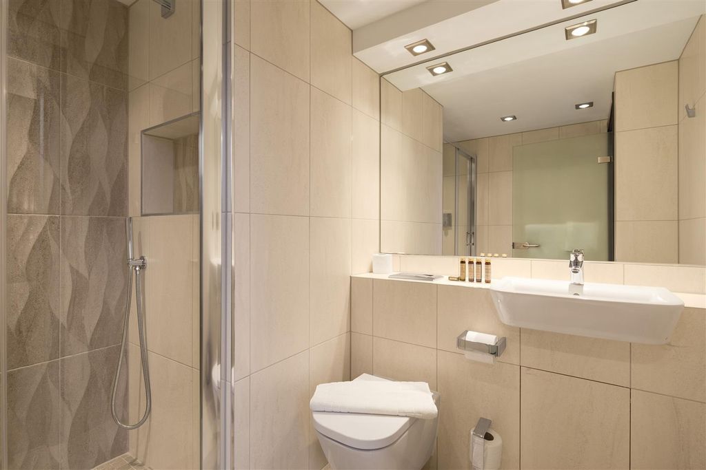 Property photo 3 of 9 Modern, Well-Kept Bathroom With A Walk-In Shower, ...