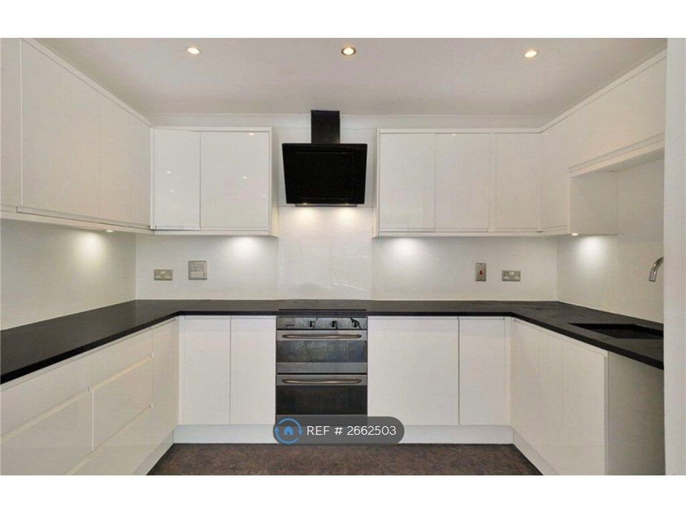 Property photo 3 of 8 Kitchen